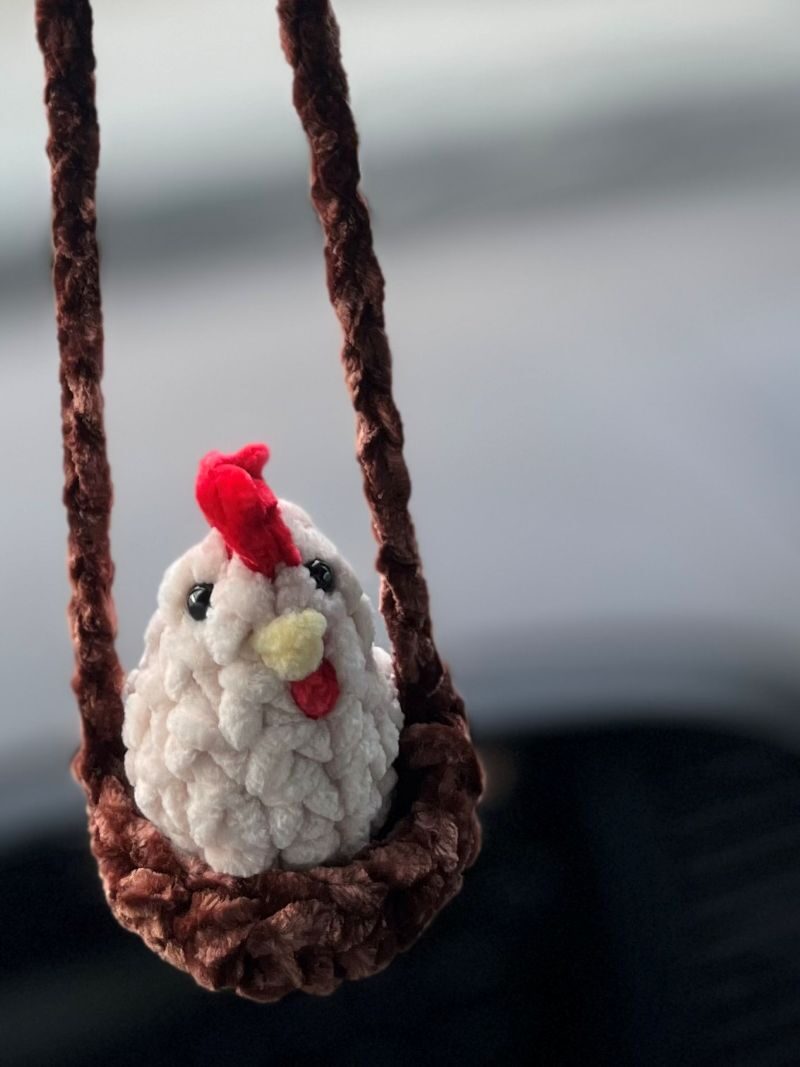 Chicken Car Charm Crochet Pattern is a small crochet chicken that is hung on a rear view mirror to decorate cars
