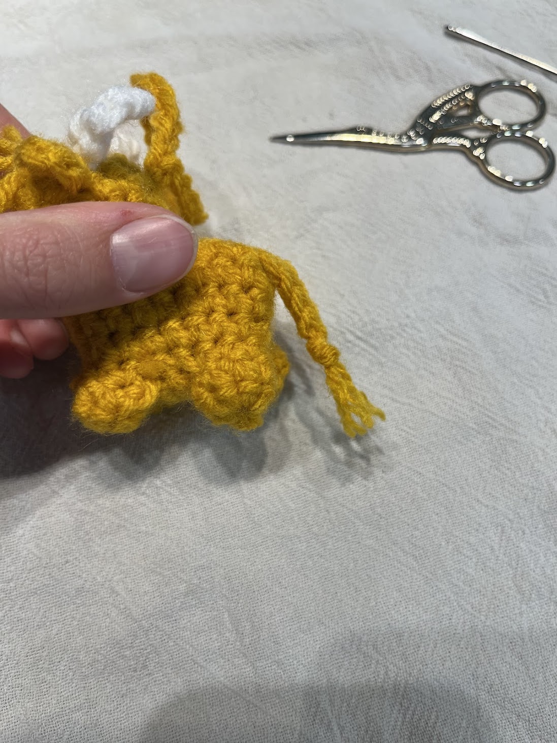 Highland Cow Christmas Ornament Crochet Pattern with tail attached