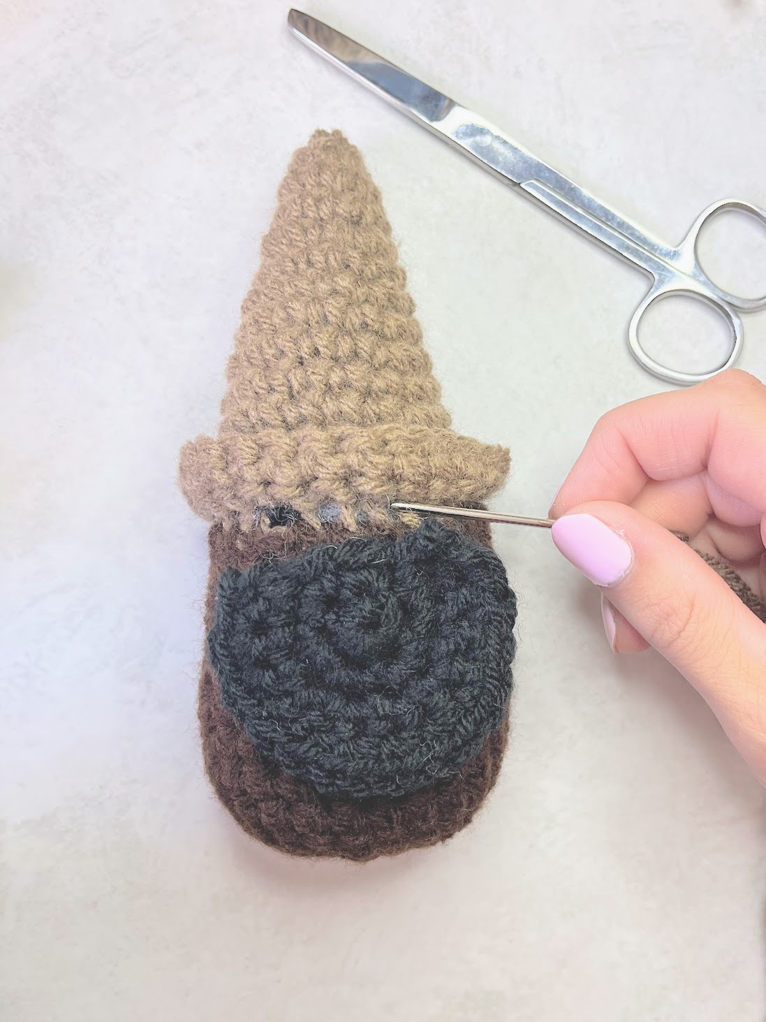 Gnome Nativity Crochet Pattern Gnome getting the Beard Stitched on
