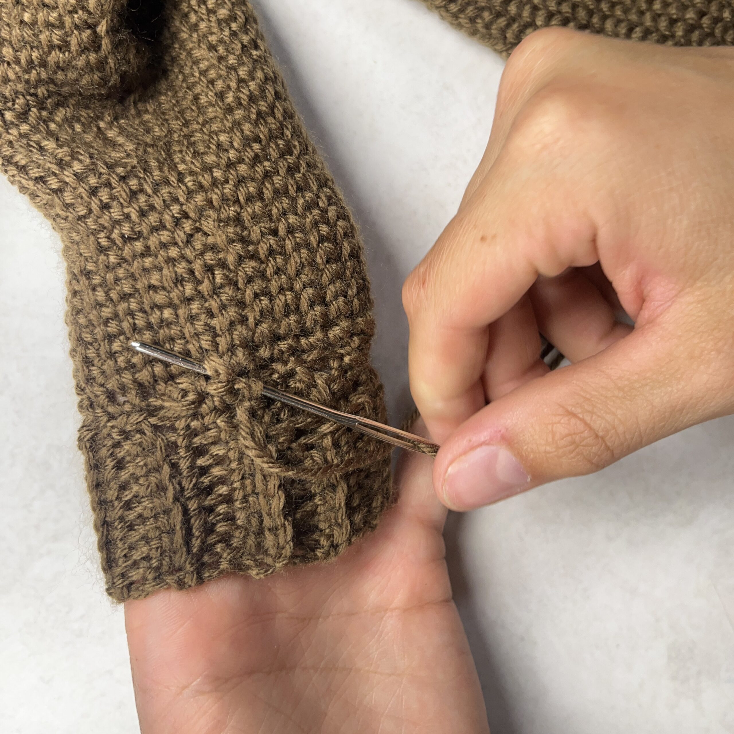 Sweater sleeve of Baby Bunny Sweater Crochet Pattern